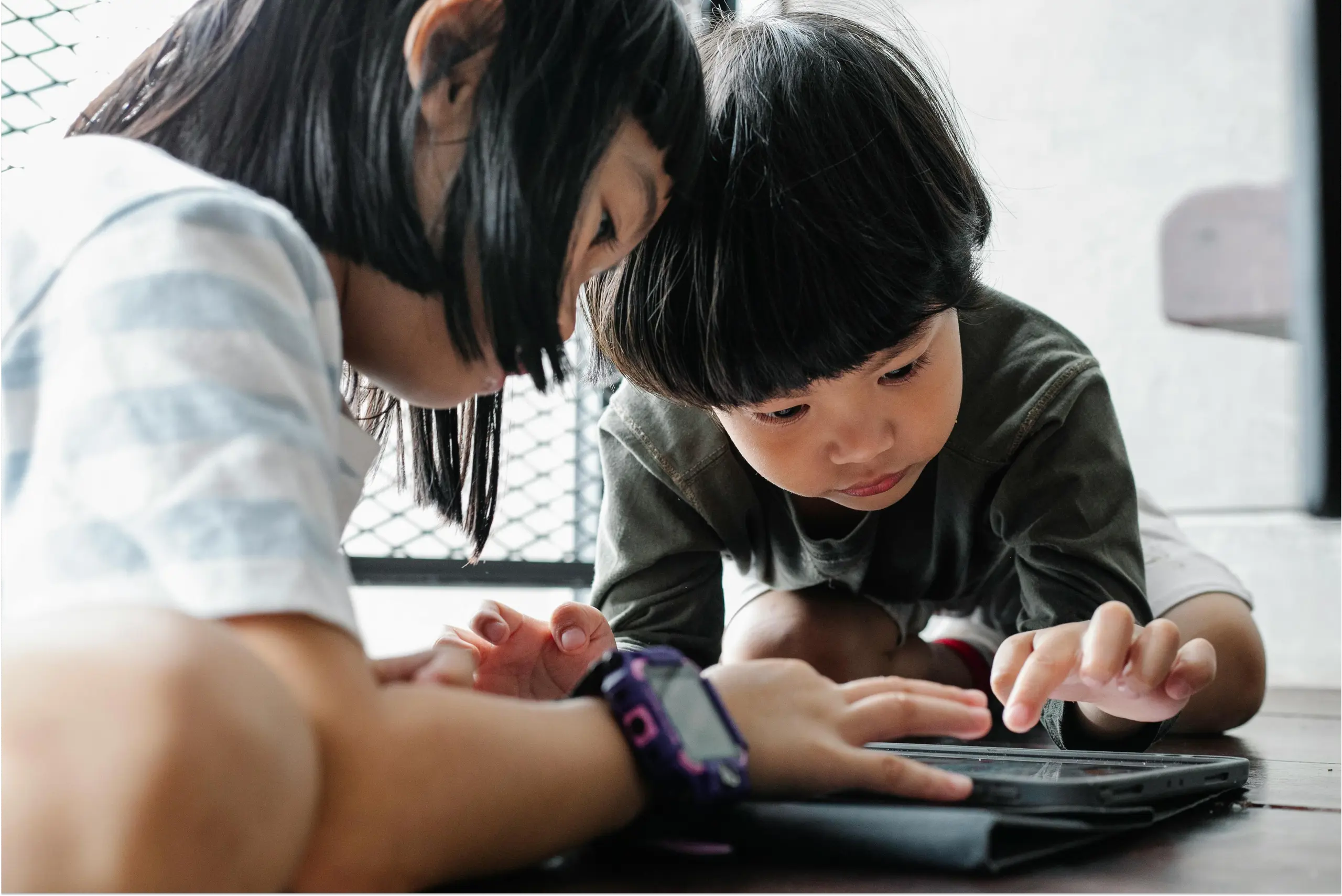 Children playing with tablet